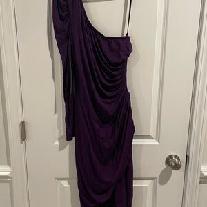 Bebe purple one shoulder cut out dress in size M